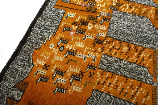 Backside of handmade 2000s Persian Gabbeh rug showing knot structure and weave density