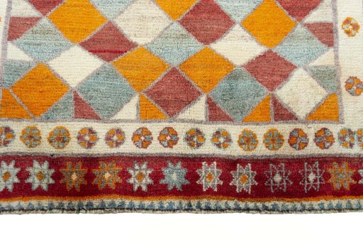 Central medallion detail of 2000s Persian Gabbeh rug from Iran / Persia