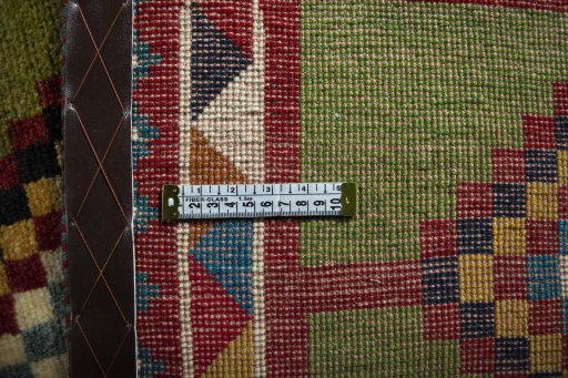 Close-up detail of 2000s Persian Gabbeh rug from Iran / Persia showing Wool weave