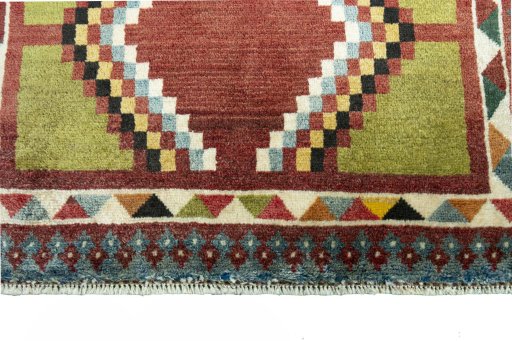 Central medallion detail of 2000s Persian Gabbeh rug from Iran / Persia