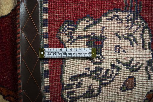 Corner detail of 2000s Persian Gabbeh rug showing border pattern and Wool pile