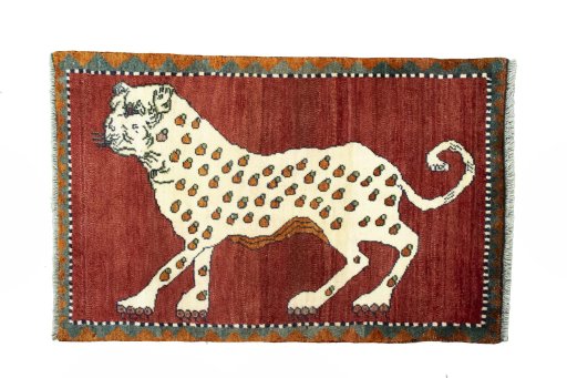 Full view of 2000s Persian Gabbeh rug from Iran / Persia, 125 × 80 cm in Red tones