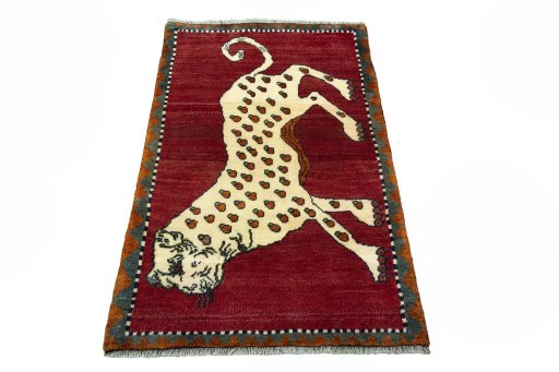 Surface texture of 2000s Persian Gabbeh rug with natural Wool and intricate pattern