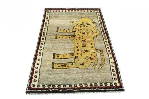 Surface texture of 2000s Persian Gabbeh rug with natural Wool and intricate pattern