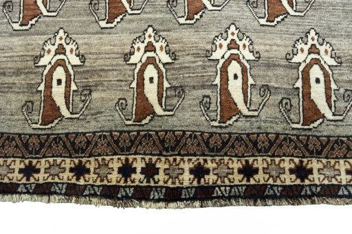 Backside of handmade 2000s Persian Gabbeh rug showing knot structure and weave density
