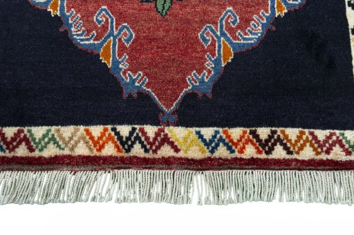 Central medallion detail of 2000s Persian Gabbeh rug from Iran / Persia