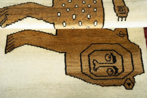 Full view of 2000s Persian Gabbeh rug from Iran / Persia, 128 × 84 cm in Beige tones