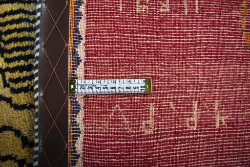 Close-up detail of 2000s Persian Gabbeh rug from Iran / Persia showing Wool weave