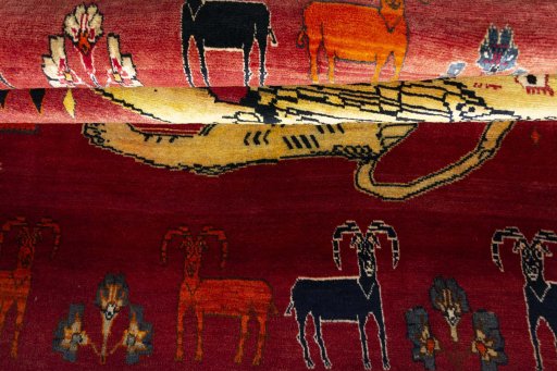 Full view of 2000s Persian Gabbeh rug from Iran / Persia, 223 × 160 cm in Red tones
