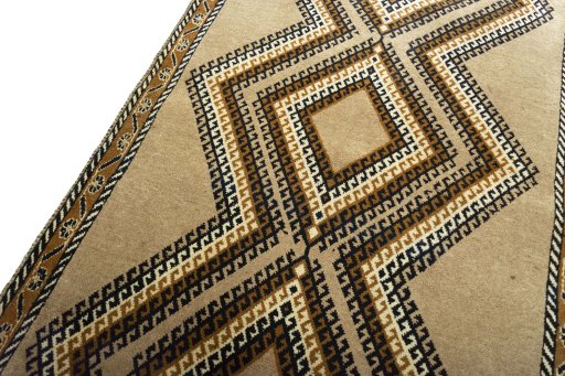 Backside of handmade 2000s Persian Gabbeh rug showing knot structure and weave density