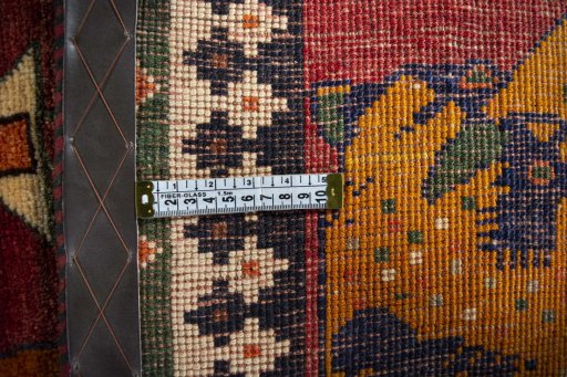 Close-up detail of 2000s Persian Gabbeh rug from Iran / Persia showing Wool weave