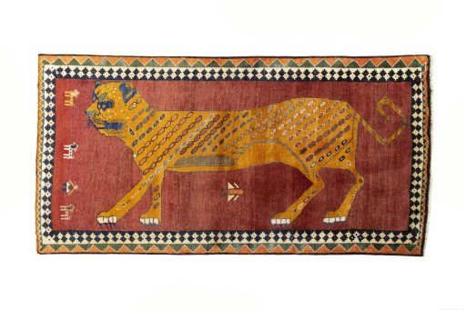 Full view of 2000s Persian Gabbeh rug from Iran / Persia, 213 × 108 cm in Red tones