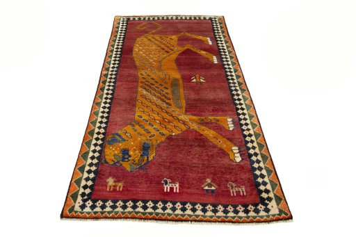 Surface texture of 2000s Persian Gabbeh rug with natural Wool and intricate pattern