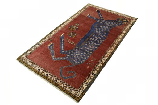 Corner detail of 2000s Persian Gabbeh rug showing border pattern and Wool pile