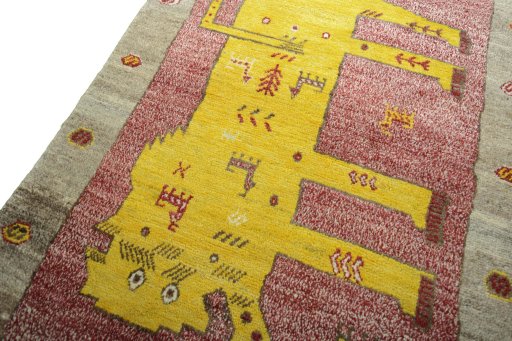 Backside of handmade 2000s Persian Gabbeh rug showing knot structure and weave density