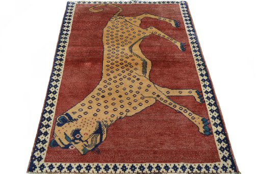 Surface texture of 2000s Persian Gabbeh rug with natural Wool and intricate pattern
