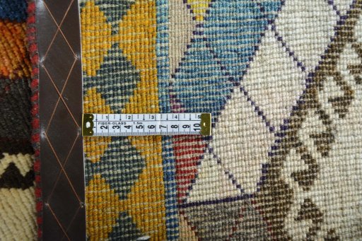 Close-up detail of 2000s Persian Gabbeh rug from Iran / Persia showing Wool weave