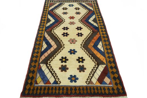 Surface texture of 2000s Persian Gabbeh rug with natural Wool and intricate pattern