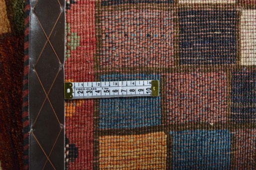 Close-up detail of 2000s Persian Gabbeh rug from Iran / Persia showing Wool weave