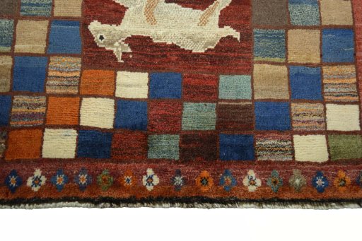 Central medallion detail of 2000s Persian Gabbeh rug from Iran / Persia
