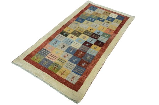 Corner detail of New Persian Gabbeh rug showing border pattern and Wool pile