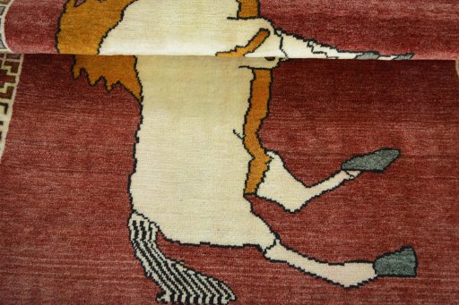 Full view of 2000s Persian Gabbeh rug from Iran / Persia, 150 × 103 cm in Red tones