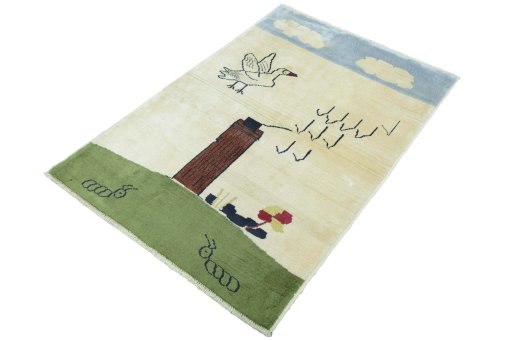 Corner detail of 2000s Persian Gabbeh rug showing border pattern and Wool pile