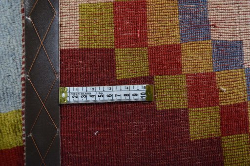 Close-up detail of 2000s Persian Gabbeh rug from Iran / Persia showing Wool weave