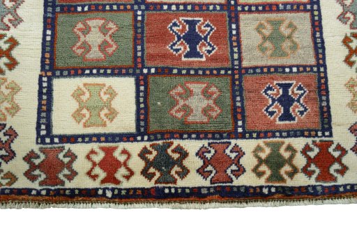 Central medallion detail of 2000s Persian Gabbeh rug from Iran / Persia
