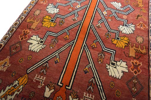 Backside of handmade 2000s Persian Gabbeh rug showing knot structure and weave density
