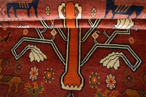 Full view of 2000s Persian Gabbeh rug from Iran / Persia, 191 × 133 cm in Red tones