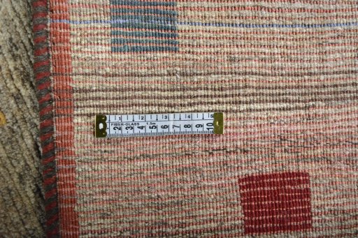 Close-up detail of 2000s Persian Gabbeh rug from Iran / Persia showing Wool weave