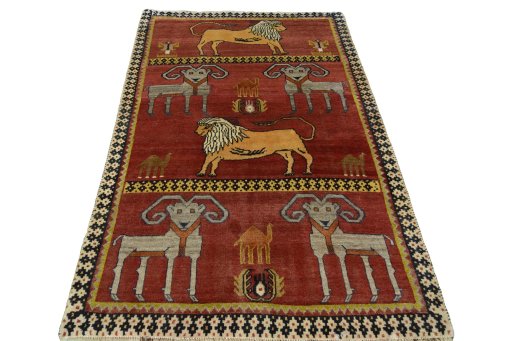 Surface texture of 2000s Persian Gabbeh rug with natural Wool and intricate pattern