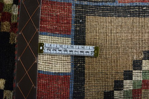 Close-up detail of 2000s Persian Gabbeh rug from Iran / Persia showing Wool weave