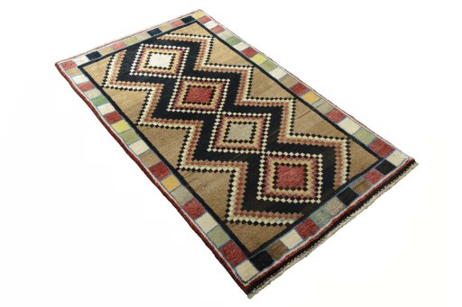 Close-up detail of 2000s Persian Gabbeh rug from Iran / Persia showing Wool weave