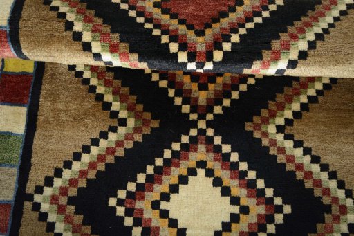 Full view of 2000s Persian Gabbeh rug from Iran / Persia, 165 × 101 cm in Multi Color tones
