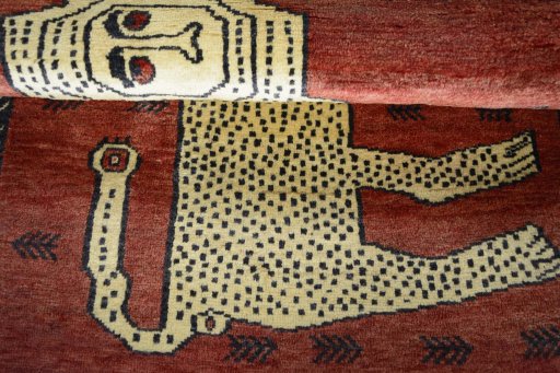 Full view of 2000s Persian Gabbeh rug from Iran / Persia, 141 × 98 cm in Red tones
