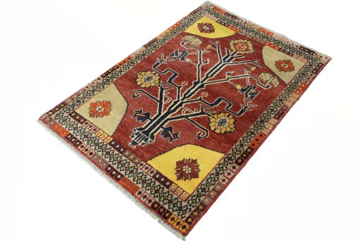 Corner detail of 2000s Persian Gabbeh rug showing border pattern and Wool pile