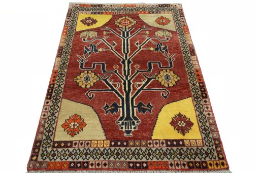 Surface texture of 2000s Persian Gabbeh rug with natural Wool and intricate pattern
