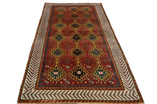 Surface texture of 2000s Persian Gabbeh rug with natural Wool and intricate pattern