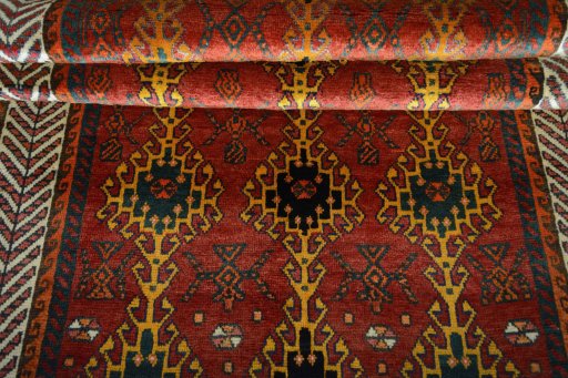 Full view of 2000s Persian Gabbeh rug from Iran / Persia, 231 × 124 cm in Red tones