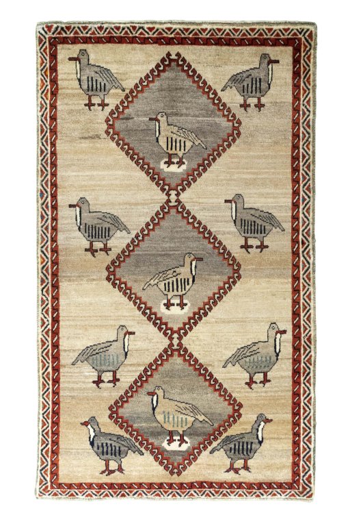 Full view of 2000s Persian Gabbeh rug from Iran / Persia, 202 × 117 cm in Beige tones