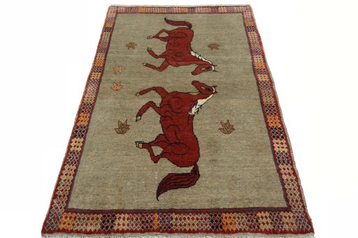 Surface texture of 2000s Persian Gabbeh rug with natural Wool and intricate pattern