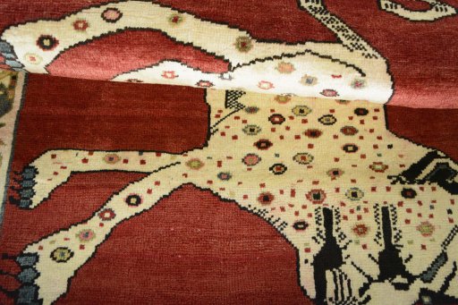 Full view of 2000s Persian Gabbeh rug from Iran / Persia, 146 × 102 cm in Red tones