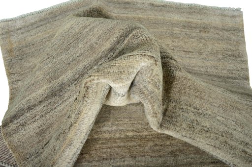 Corner detail of New Persian Gabbeh rug showing border pattern and Wool pile