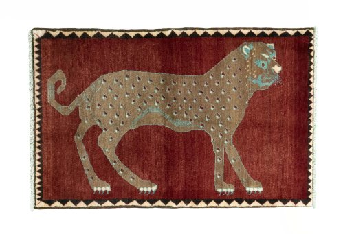 Full view of 2000s Persian Gabbeh rug from Iran / Persia, 144 × 93 cm in Red tones