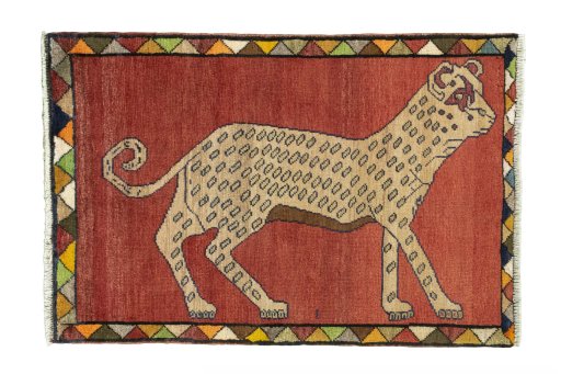 Full view of 2000s Persian Gabbeh rug from Iran / Persia, 115 × 76 cm in Red tones