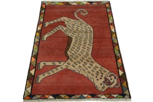 Surface texture of 2000s Persian Gabbeh rug with natural Wool and intricate pattern
