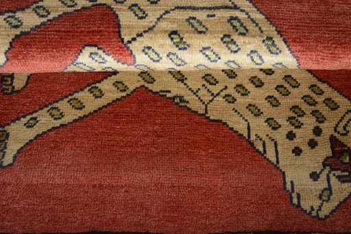 Full view of 2000s Persian Gabbeh rug from Iran / Persia, 115 × 76 cm in Red tones