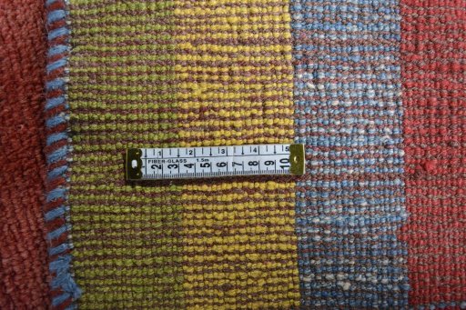 Close-up detail of 2000s Persian Gabbeh rug from Iran / Persia showing Wool weave